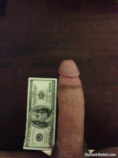 big dick against a 100 dollars bill